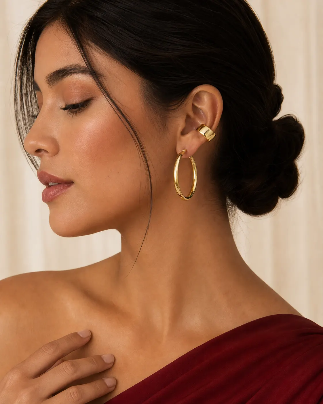 Aretes dorados de la colección Mujeres
